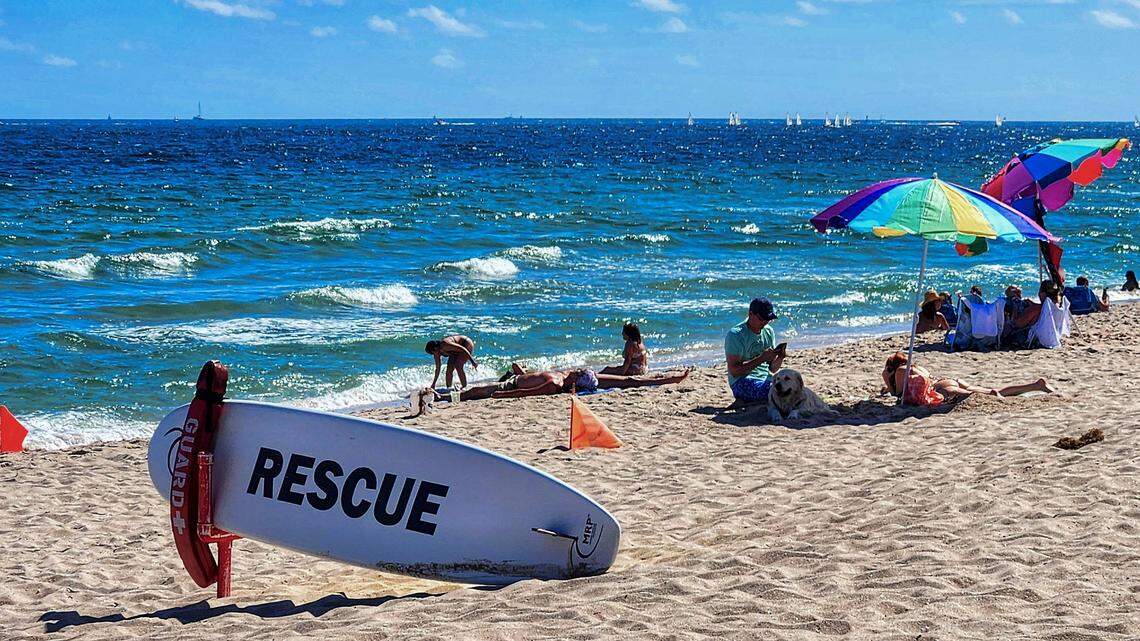 Ft Lauderdale, Florida, February, 8, 2025 - Beachgoers at Las Olas Beach in Fort Lauderdale staying out of the water due to oily tar balls washing up on the shore. The Coast Guard is investigating. Photo: Scott Luxor, Sun Sentinel