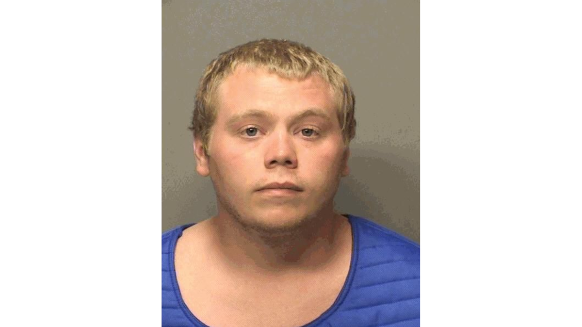 Police say Joseph Hanvey admitted to downloading child porn after an online virus said his phone was being monitored by the FBI and turned it off. He turned himself in, police say, but it was just a scam.