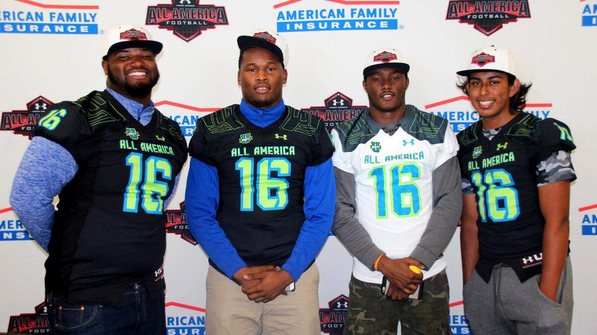In this file photo, IMG Academy’s Shavar Manuel (far left), Rahshaun Smith, Saivion Smith and Ricky Aguayo pose with their Under Armour All-America Game jerseys Thursday at IMG’s Fieldhouse.
