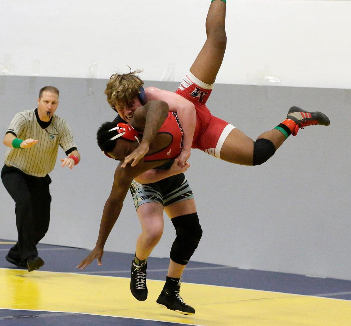 Peter Mocco, Coral Springs Charter , wrestles Jivari Milton, Miramar, during 190 lb BCAA Wrestling Championship on Saturday, February 3, 2024 at Pompano Beach HS in Pompano Beach. Andrew Uloza / for Miami Herald