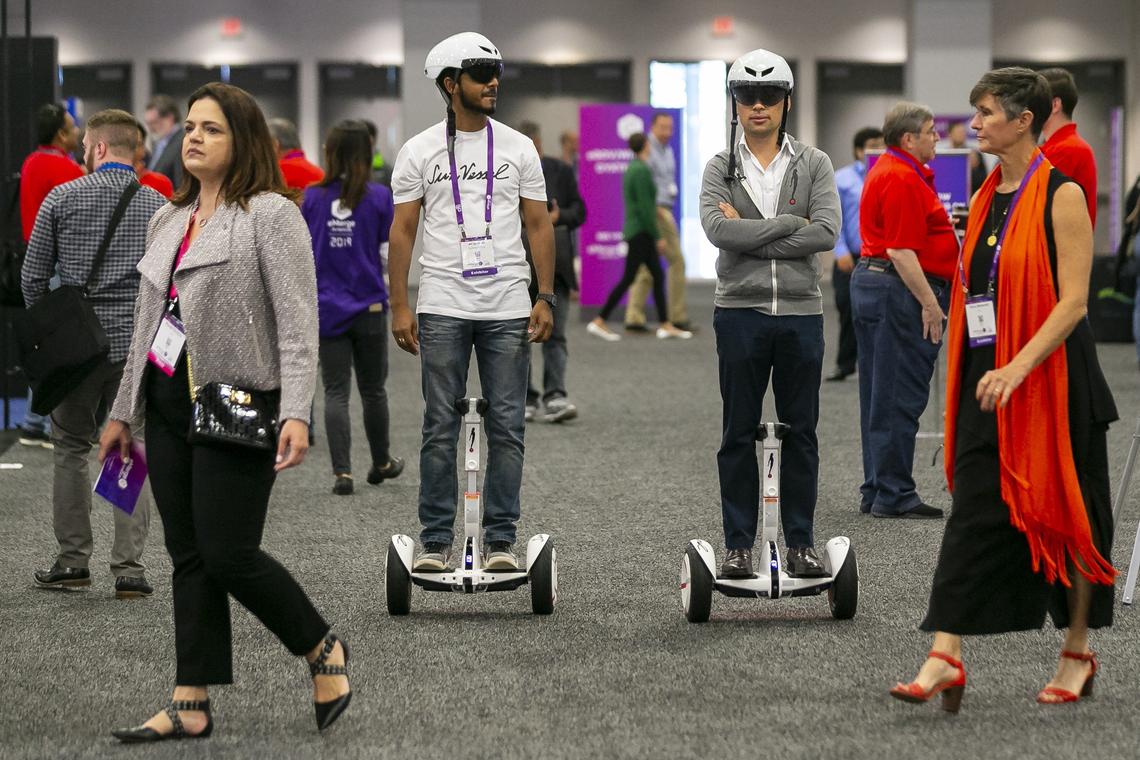 Ali Qureshi, 32, left, a lead designer, and Sebastian Gomez Puerto, 33, CEO and founder, demonstrate how the SunVessel operates during the technology conference, eMerge Americas, inside the Miami Beach Convention Center in Miami Beach, Florida on Monday, April 29, 2019.