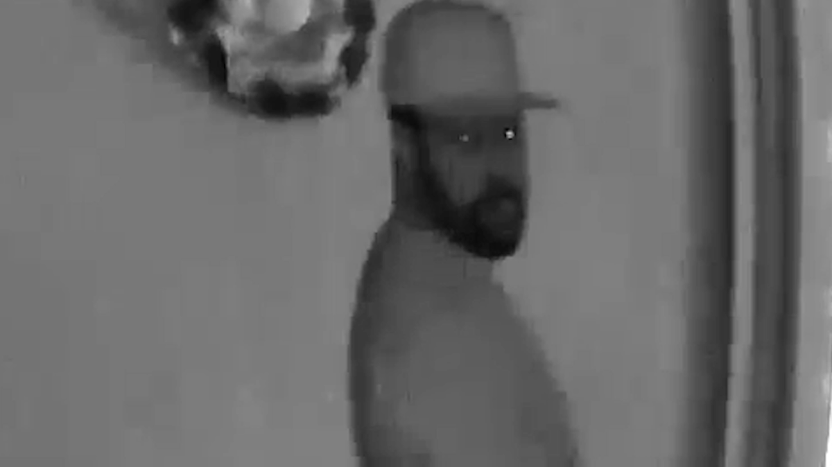 A photo of the man caught on tape as he peeped into a home in Weston.