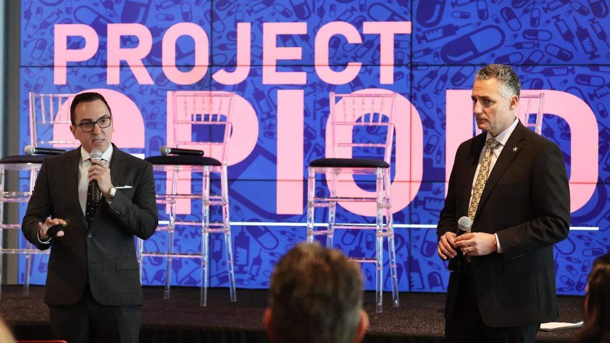 Andrae Bailey, founder of Project Overdose, and Seminole County Sheriff Dennis Lemma, governor-appointed state task force chair, announce a 46% drop in overdose deaths in 2024 during the Project Opioid symposium at Florida Atlantic University in Boca Raton, Florida, on Tuesday, Feb. 25, 2025.
