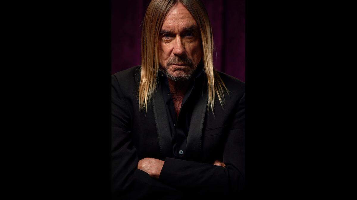Iggy Pop in the shadows. The Miami-based rocker has a new single out called “James Bond” and its video was filmed on location at Sweat Records.