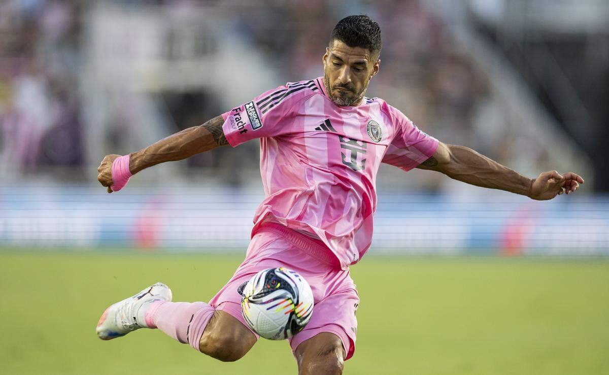 Inter Miami forward Luis Suárez (9) takes a shot toward the goal in the first half of his Leagues Cup Phase One soccer match against Atlas at Chase Stadium on Wednesday, July 30, 2025, in Fort Lauderdale, Fla.
