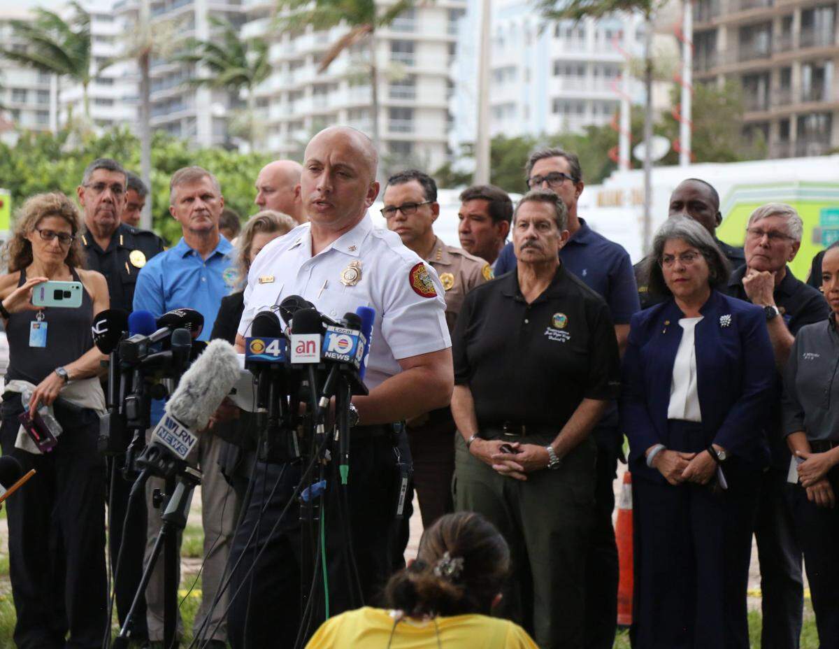 Miami-Dade Fire Rescue Assistant Fire Chief Ray Jadallah speaks to the media Thursday morning, June 24, 2021, following the early morning partial collapse of the Champlain Towers South condo at 8777 Collins Ave. in Surfside.