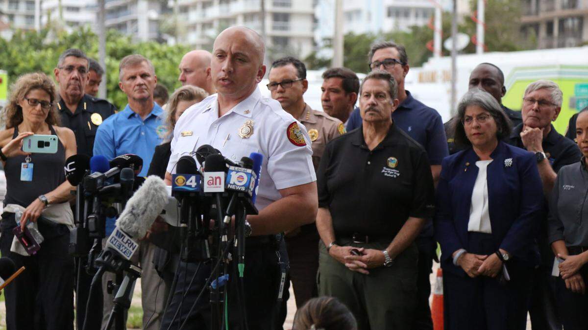 Miami-Dade Fire Rescue deputy fire chief of operations, Raied “Ray” Jadallah, speaks to the media on June 24, 2021, following the early morning partial collapse of the Champlain Towers South condo in Surfside. Thirteen months later, Mayor Daniella Levine Cava named him the county’s new fire chief, replacing Alan Cominsky, who assumes the new role of chief fire marshal.