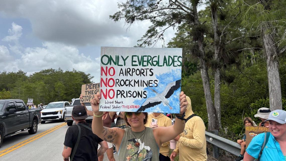 Ochopee, Florida, June 28, 2025 - Protesters rally near Dade-Collier Training and Transition Airport where a migrant detention center is being built. The center, which is being called “Alligator Alcatraz,” is in the middle of the Everglades. Protesters argue the detention center could damage the fragile ecosystem of the area.
