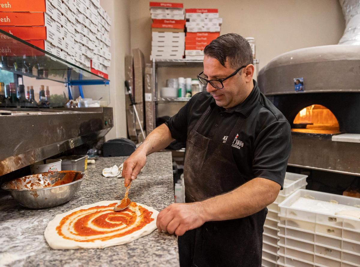 Ciro Maresca prepares a Margherita pizza at Napoli 1800 Cucina & Pizzeria.