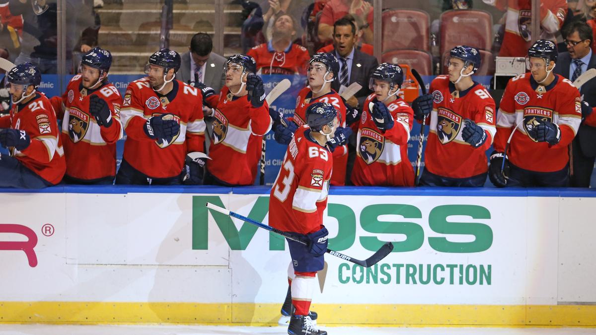 Florida Panthers right wing Evgenii Dadonov (63) celebrates with the bench after scoring during the first period of an NHL regular season hockey game against the Columbus Blue Jackets at the BB&T Center on Thursday, October 11, 2018 in Sunrise.