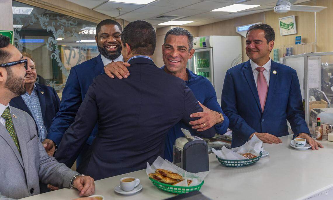 Local elected officials including, from right-Commissioner Rafael “Ralph” Rosado  Francis Suarez, former City of Miami Mayor, Vincent Lago, City of Coral Gables Mayor and Juan Carlos Porras, Florida Representative, joined U.S. Congressman Byron Donalds at la ventanita area for a “Cuban Cafesito” at the Versailles Cuban Cuisine restaurant in Little Havana, for an “Ask Byron Anything” meet-and-greet event as part of his campaign to run in the 2026 Republican primary for Florida governor, on Monday, March 02, 2026.