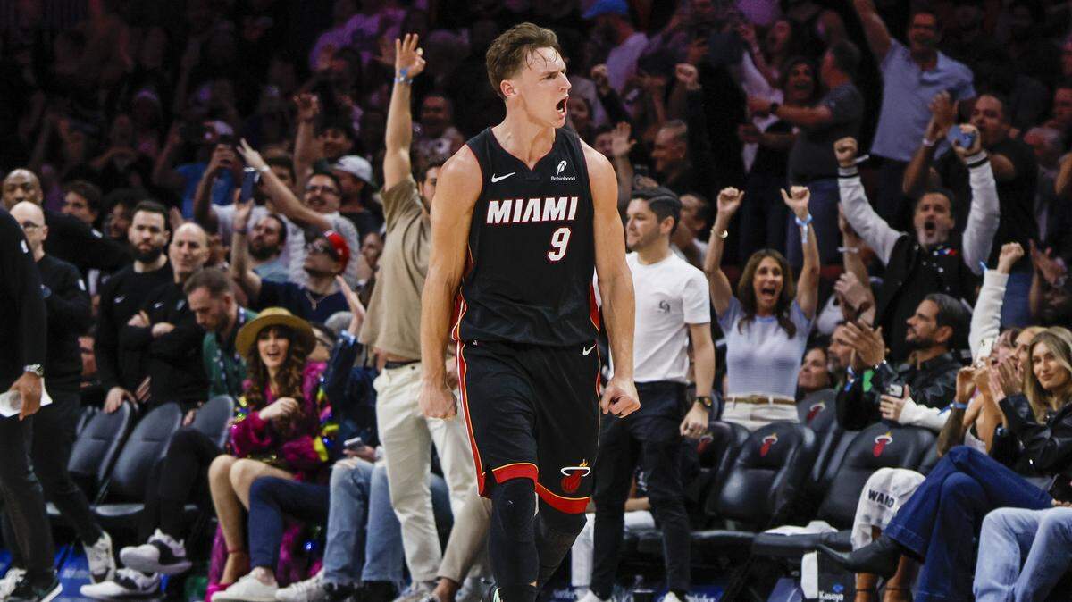 Miami Heat guard Pelle Larsson (9) reacts after sinking a three pointer late in the fourth quarter to seal the game against the Milwaukee Bucks during their NBA basketball game at Kaseya Center in Miami on March 12, 2026.