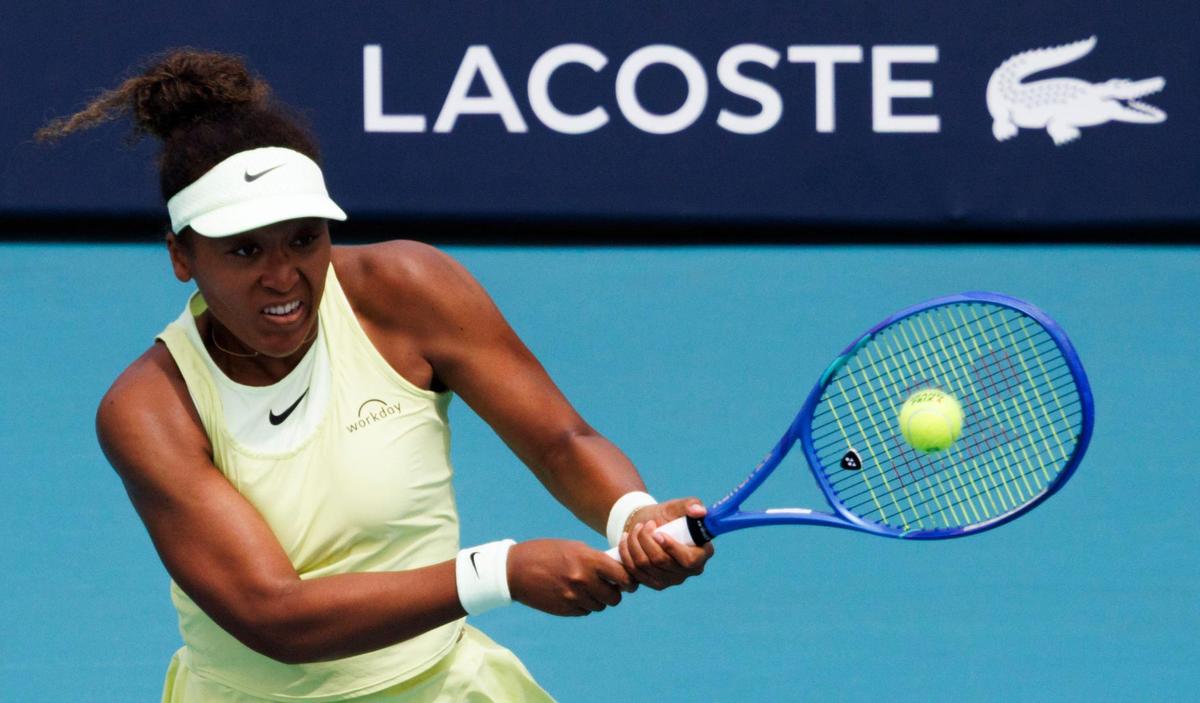 Naomi Osaka (JPN) returns a ball to Jasmine Paolini (ITA) during the Miami Open on Monday, March 24, 2025, at Hard Rock Stadium in Miami Gardens, Fla. Paolini won the match.