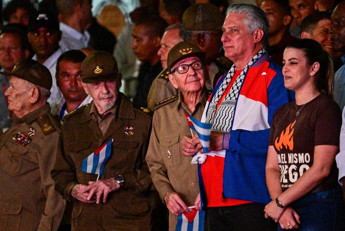 (L-R) Commander Guillermo Garcia, Commander Ramiro Valdez, Cuban former President Raul Castro and Cuban President Miguel Diaz-Canel take part in the Torchlight March commemorating the 171th anniversary of the birth of national hero, poet and activist Jose Marti in Havana, on January 27, 2024. (Photo by ADALBERTO ROQUE / AFP) (Photo by ADALBERTO ROQUE/AFP via Getty Images)