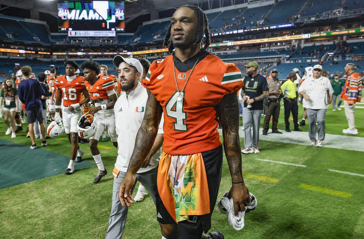 Miami Hurricanes running back Mark Fletcher Jr. (4) walks off the field after the Canes defeat Syracuse Orange of an NCAA football game at Hard Rock Stadium in Miami Gardens, Florida on Saturday, November 8, 2025.