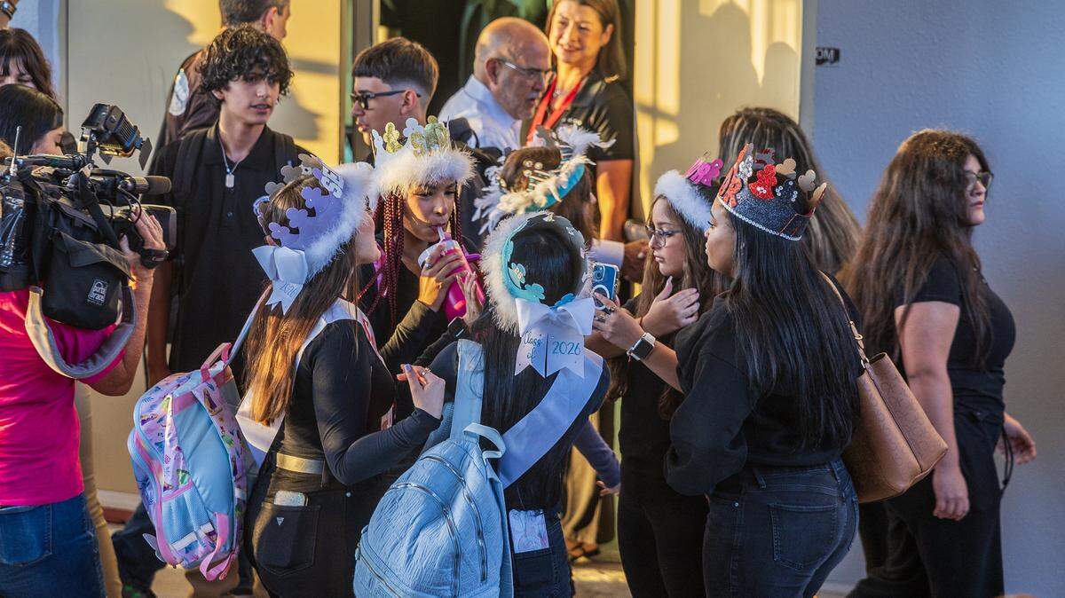 Students shared as they arrive to the Westland Hialeah Senior High School during, the first day of school for Miami-Dade County Public Schools (M-DCPS) in the 2025-2026 school year, on Thursday, August 14, 2025.