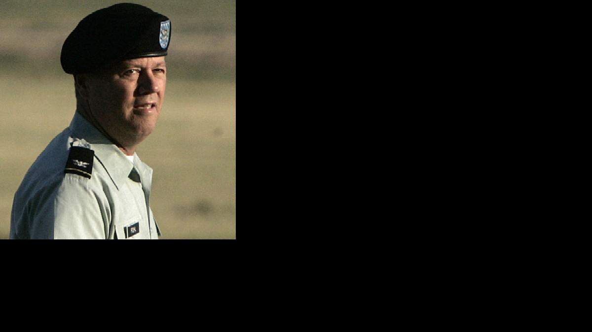 U.S. Army military judge Col. James L. Pohl arrives for a pretrial hearing for U.S. Army Pfc. Lynndie England at Fort Hood, Texas, Thursday, July 7,  2005.