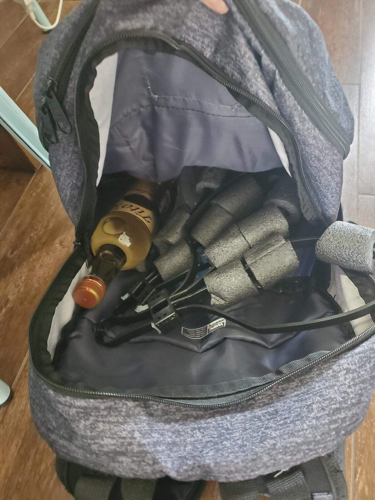 The bag belonging to Nathan Gingles that Mary Gingles reported finding in her home  to the Broward Sheriff’s Office. She was concerned it was a ‘crazy person kill kit.’ The bag contained duct tape, zip ties and a note with the word ‘waterboarding’ on it.