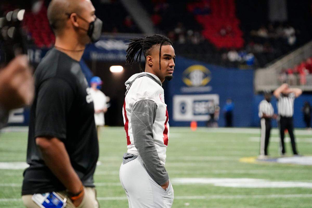 Alabama wide receiver Jaylen Waddle (17) watches the teams warm up before the first half of the Southeastern Conference championship NCAA college football game between Florida and Alabama, Saturday, Dec. 19, 2020, in Atlanta. (AP Photo/Brynn Anderson)