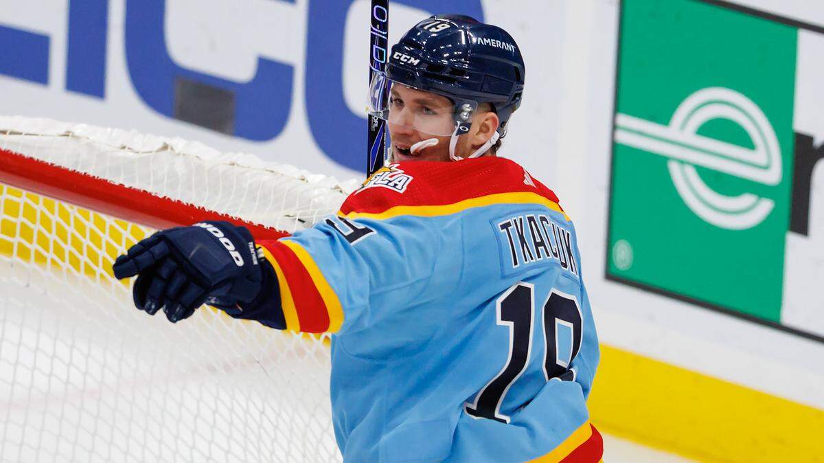 Panthers left wing Matthew Tkachuk (19) reacts after teammate Aleksander Barkov (16) scoring a power play goal during the second period of an NHL game against the Boston Bruins at FLA Live Arena on Wednesday, November 23, 2022 in Sunrise, Fl.