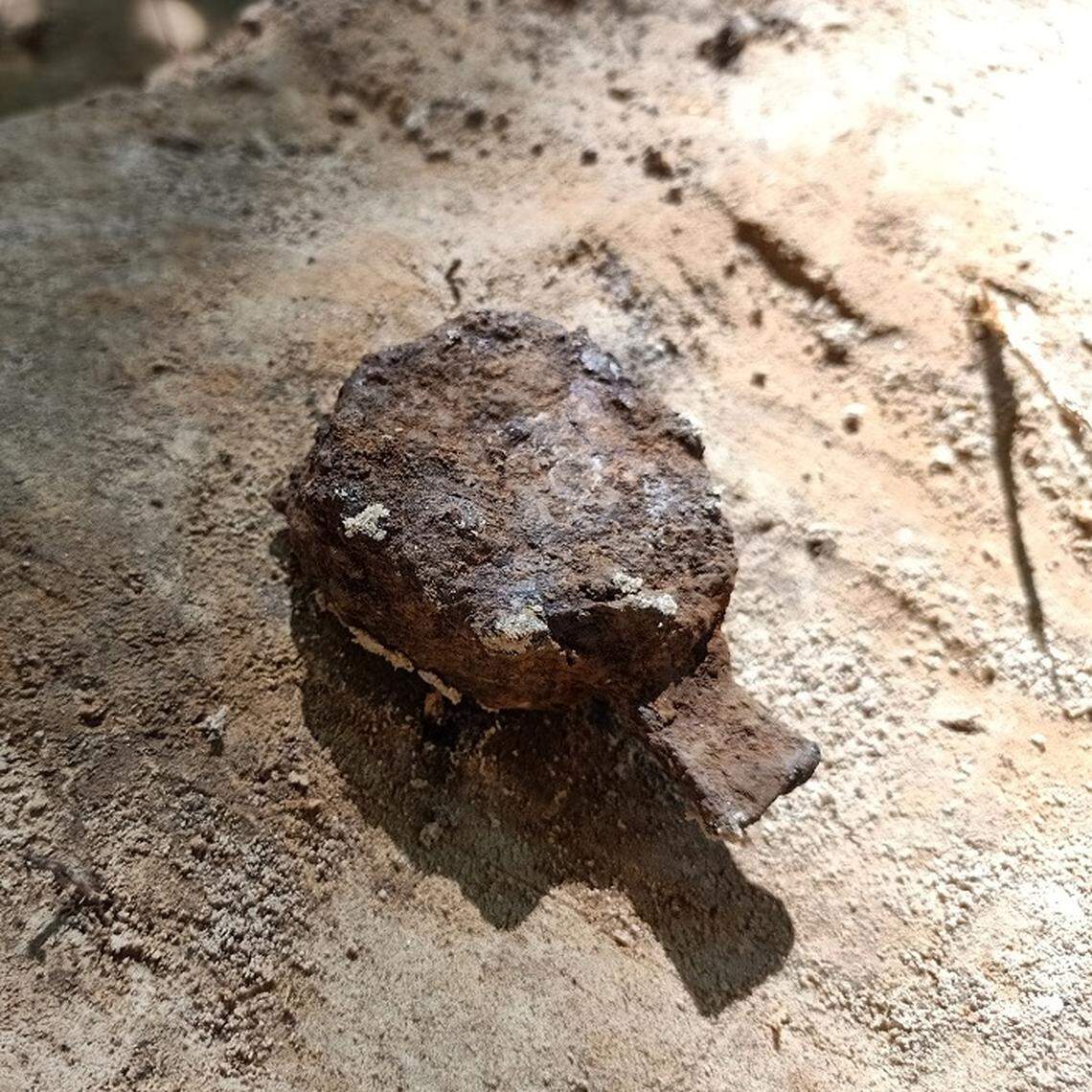 A sword pommel uncovered at the mansion.
