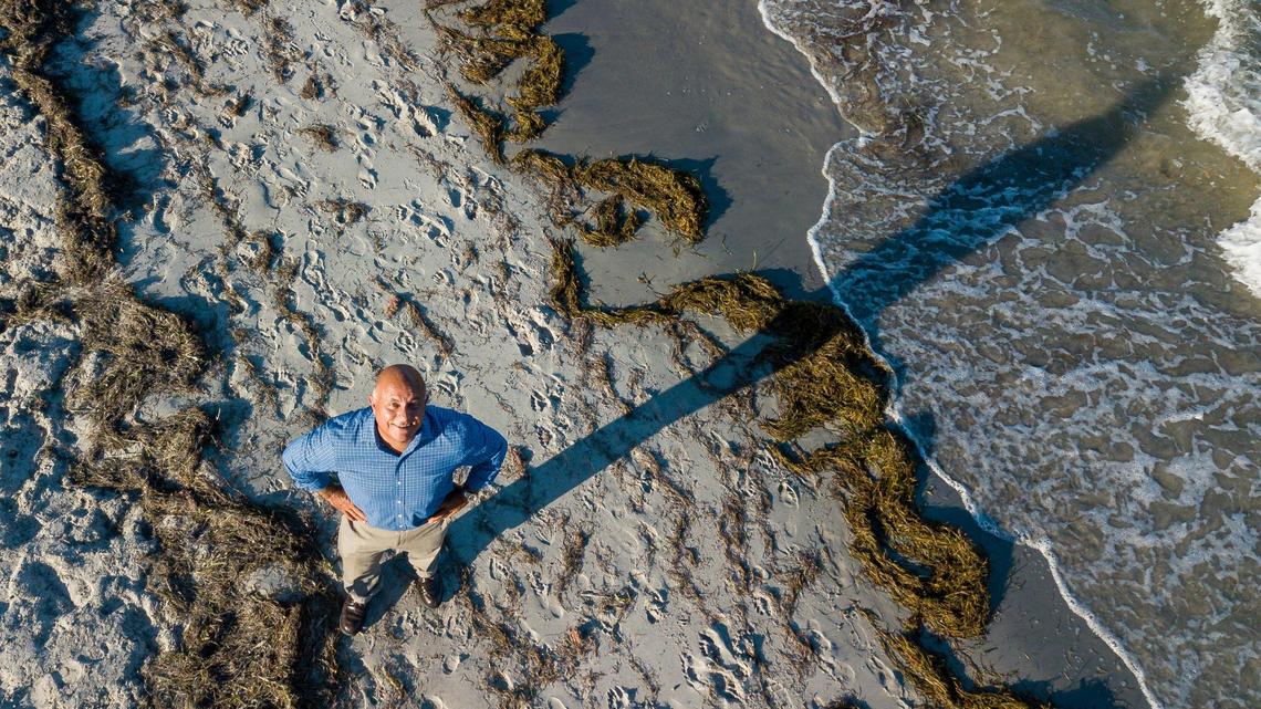 Roland Samimy, the first chief resilience officer for Key Biscayne, visits the beach in Key Biscayne, Florida, on Tuesday, September 1, 2020.
