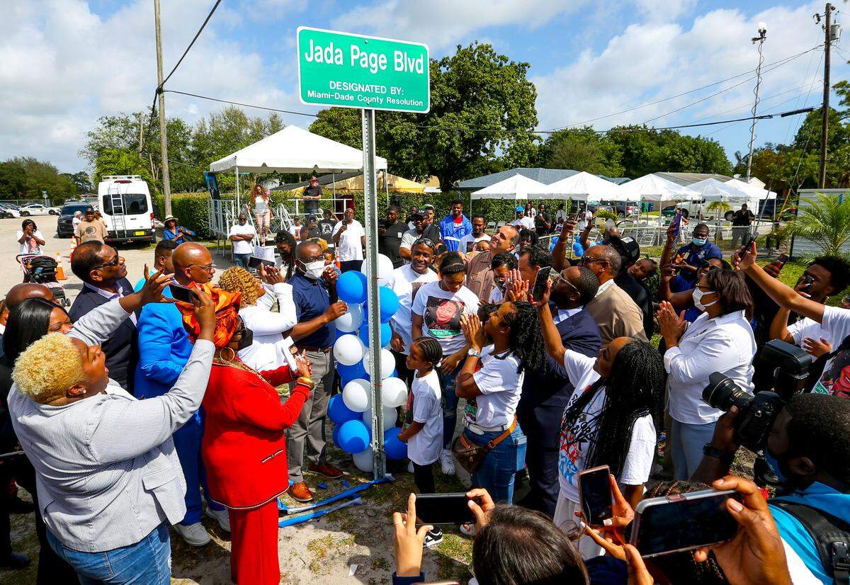 Miami-Dade commissioners joined family and friends of Jada Page, a young girl killed accidentally by gunfire years ago in front of her home, during a street naming ceremony to honor her memory by designating Jada Page Blvd at NW 25th Avenue and 102 Street in Miami, Florida, on Friday, February 18, 2022.
