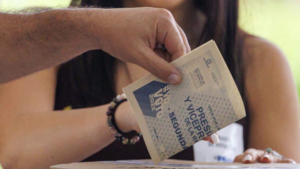 A voter casts his vote in South Florida during Colombia’s presidential runoff between Gustavo Petro and Rodolfo Hernández. He voted at the Consulate General of Colombia in Coral Gables, Florida, on June 19, 2022.