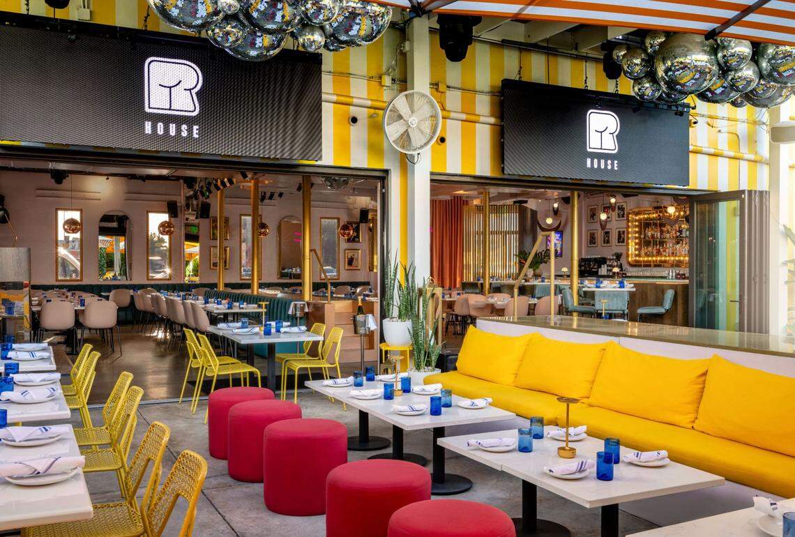 The patio and interior of R House in Wynwood, which is brighter and livelier than its original industrial self.