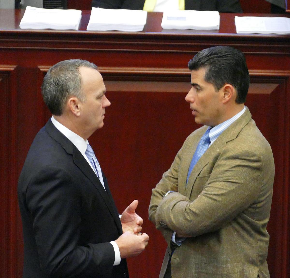 Rep. Richard Corcoran, R- Land O’ Lakes talks with Rep. Jose Oliva, R- Miami Lakes, March 9, 2016, during debate on the Florida House floor.