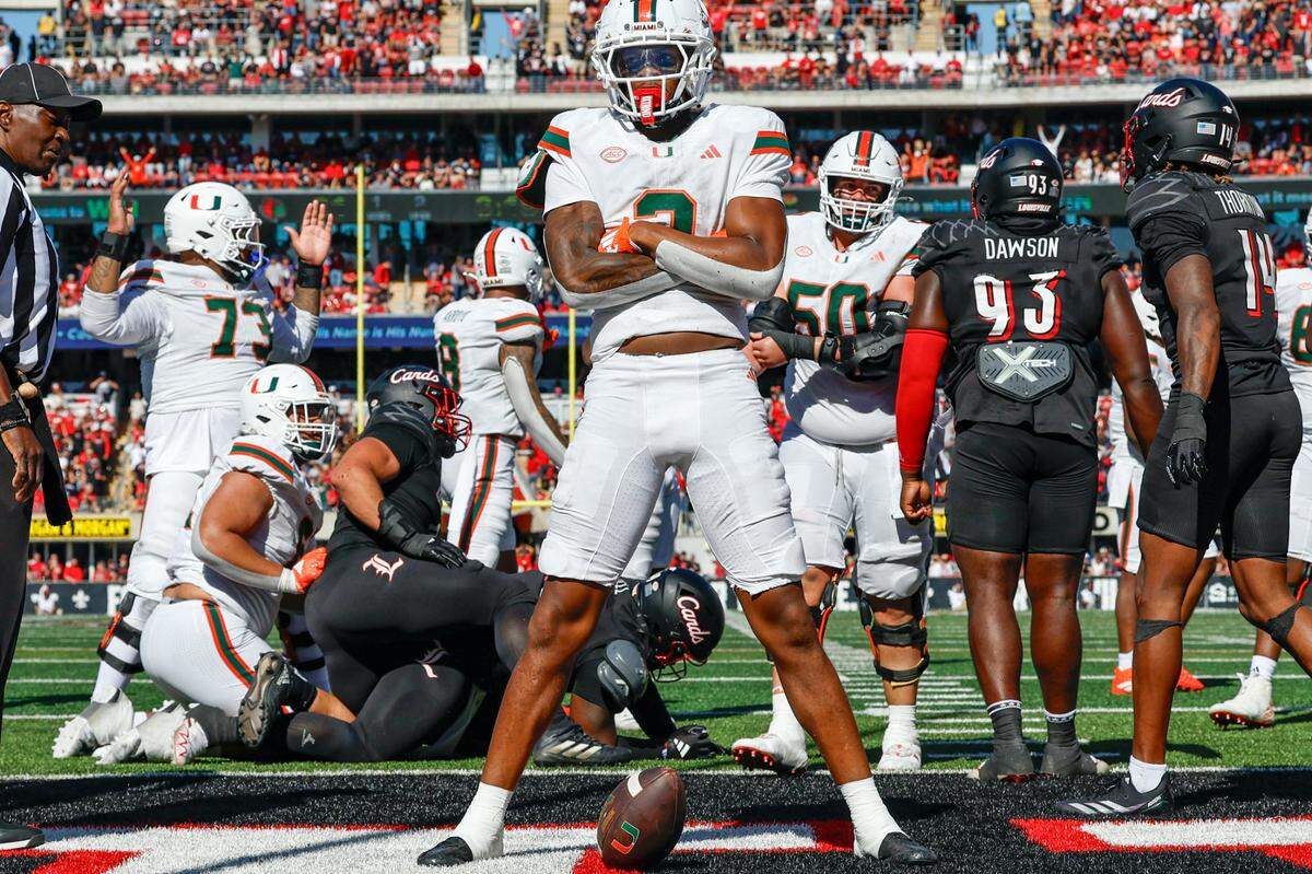 Miami Hurricanes wide receiver Isaiah Horton (2) reacts after scoreing on a pass reception in the end zone against the Louisville Cardinals in the second half during an NCAA football game at L&N Federal Credit Union Stadium in Louisville, Kentucky on Saturday, October 19, 2024.