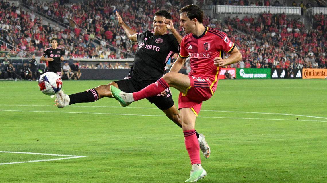 Jul 15, 2023; St. Louis, Missouri, USA; Inter Miami CF defender Ian Fray (24) and St. Louis City SC midfielder Jared Stroud (8) fights for the ball during the second half at CITYPARK. Mandatory Credit: Scott Rovak-USA TODAY Sports