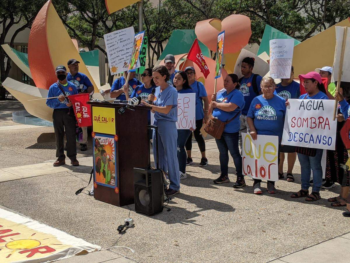 Lily Oster, an internal medicine doctor at Jackson Health, speaks about the health impacts of heat exposure on outdoor workers at a June 21, 2023 rally urging Miami-Dade County to create heat protections for outdoor workers.