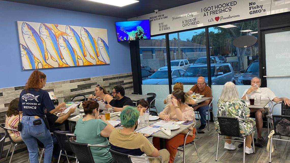 Customers at the new location of FreshCo Fish Market & Grill, which was named the best seafood restaurant in Florida by Eat This, Not That.