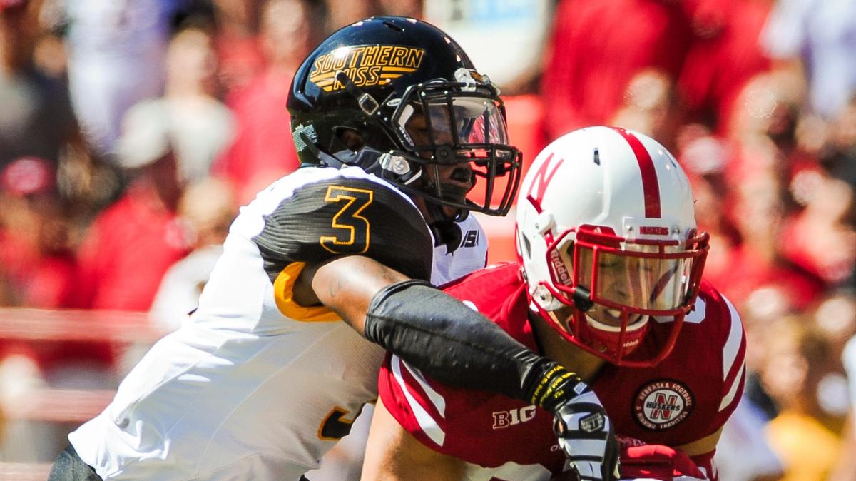 Wide receiver Brandon Reilly, No. 87 of the Nebraska Cornhuskers, catches a ball over defensive back Cornell Armstrong, No. 3 of the Southern Miss Golden Eagles, during their game at Memorial Stadium on September 26, 2015, in Lincoln, Nebraska.