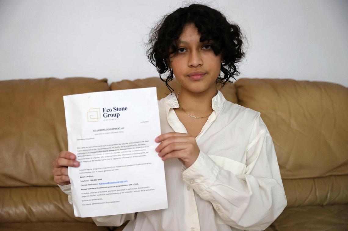 Rachel Rubi is one of the residents of the Hialeah apartment building at 1501 W 42nd St. She’s holding a notice sent by the new administration on Wednesday, Jan. 12, 2022.
