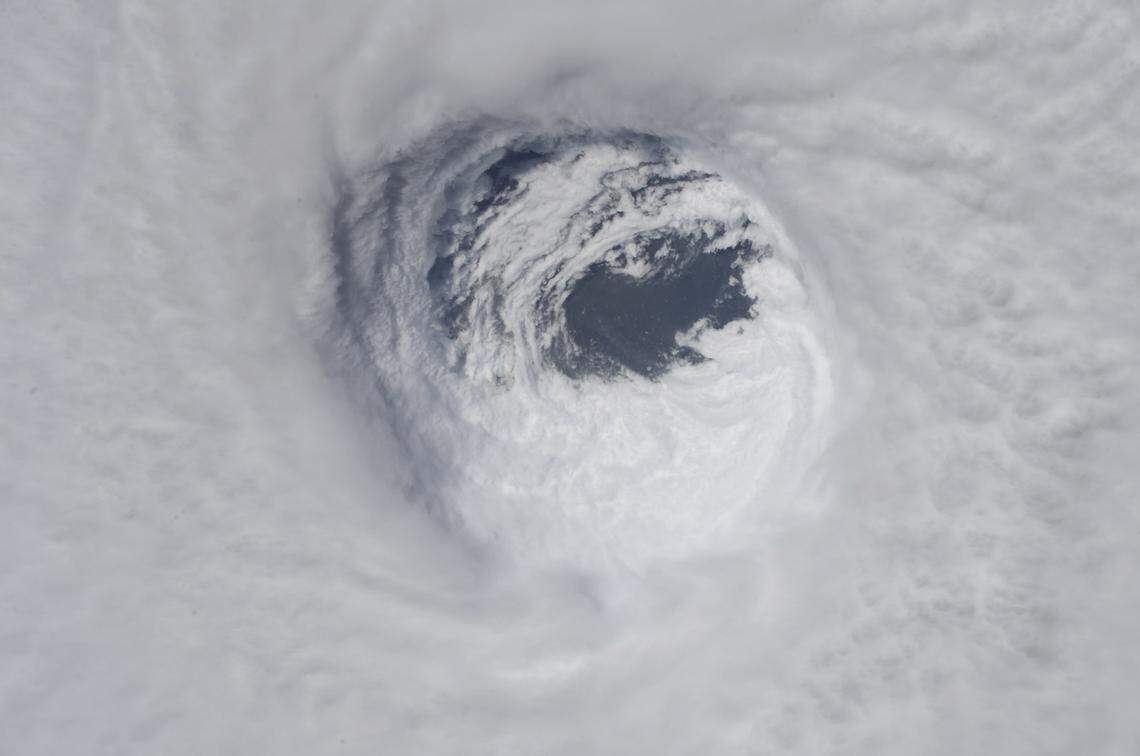 This photo made available by NASA shows the eye of Hurricane Michael as seen from the International Space Station on Wednesday, Oct. 10, 2018.