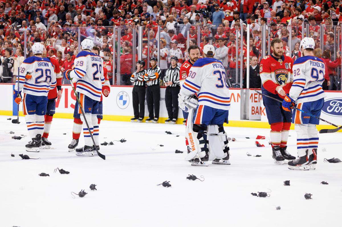 Florida Panthers shake hands with the Edmonton Oilers after winning the NHL Stanley Cup Final at Amerant Bank Arena on Tuesday, June 17, 2025 in Sunrise, Fla.