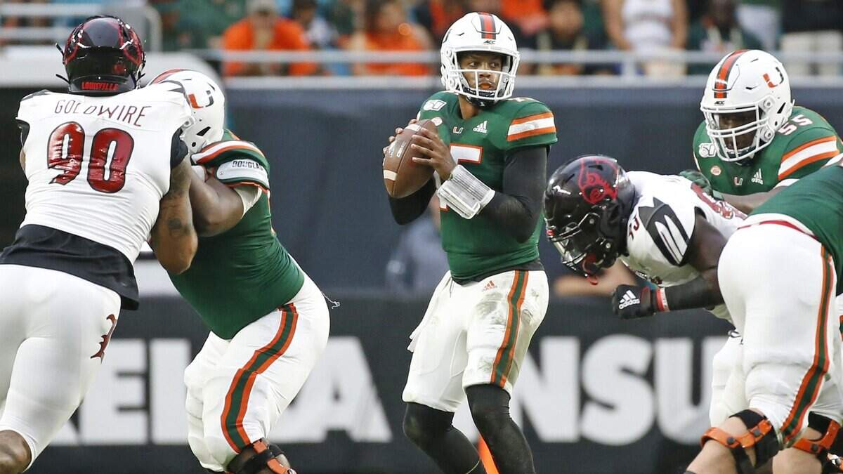 Miami Hurricanes quarterback Jarren Williams (15) looks to pass in the second quarter as the University of Miami Hurricanes host the Louisville Cardinals on Saturday, November 9, 2019.