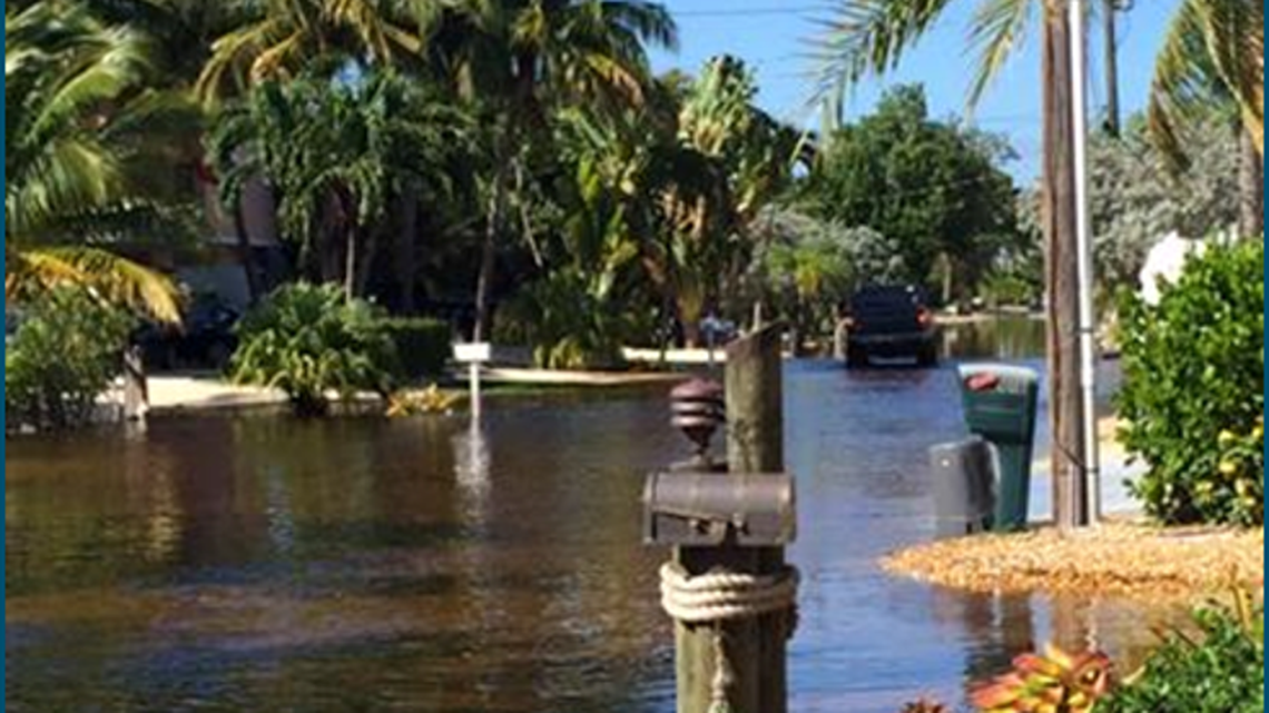 This 2015 photo shows tidal flooding in a Key Largo neighborhood.