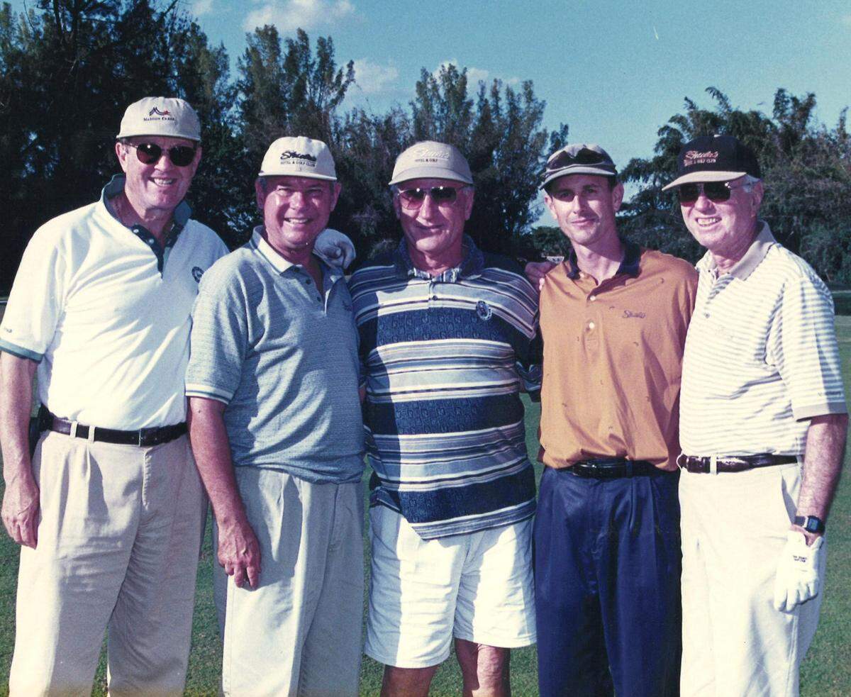 Aaron Podhurst (far left), with Don Shula (center) and former Florida Governor and Senator Bob Graham (far right)