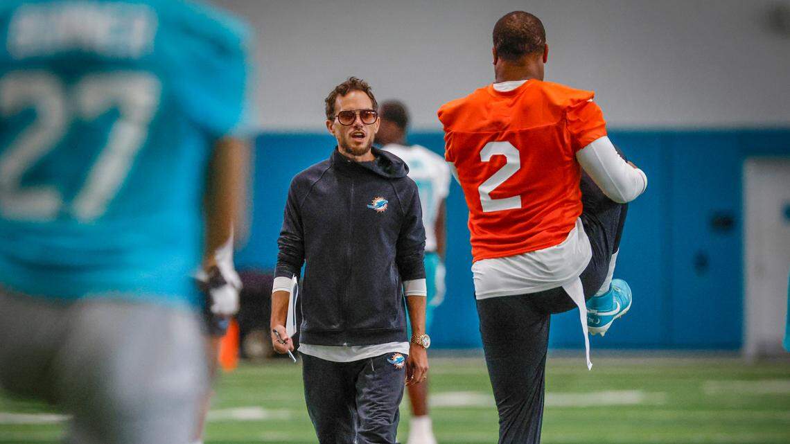 Miami Dolphins coach Mike McDaniel speaks to linebacker Bradley Chubb (2) during warmups at mandatory minicamp at the Baptist Health Training Complex in Miami Miami Gardens, Florida on Wednesday, June 11, 2025