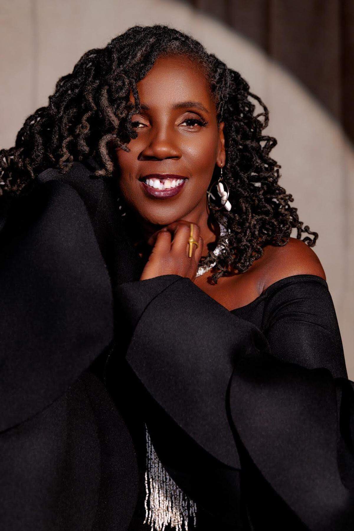Simone Hylton is co-founder of Natural Trendsetters hair salon in Fort Lauderdale. She is event lead for Coilture Freedom Festival 2025: An Afro-Futurist Rooftop Experience, a festival centered around natural hair care.