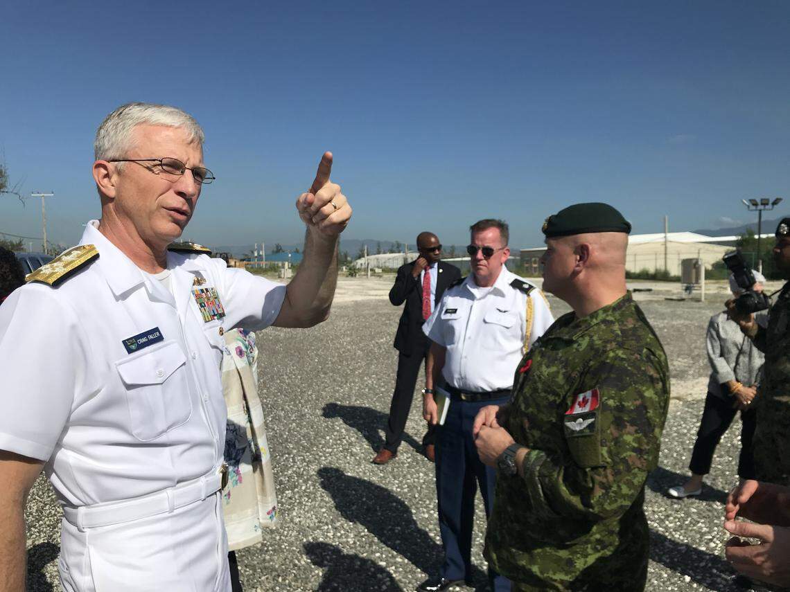 Navy Adm. Craig Faller, the head of U.S. Southern Command, visits Canadian military officers in Kingston, Jamaica on Friday, Nov. 8, 2019, to see their staging ground to address security concerns.