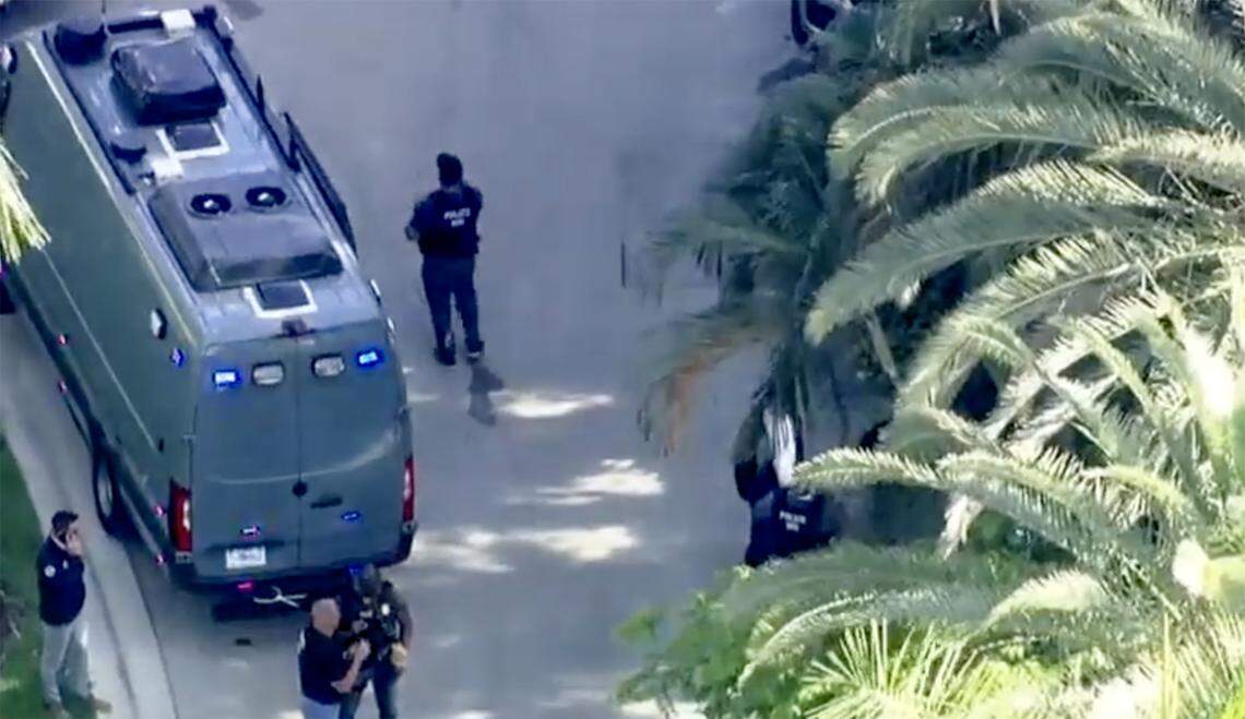 Federal agents outside the Star Island properties of Sean “Diddy” Combs.