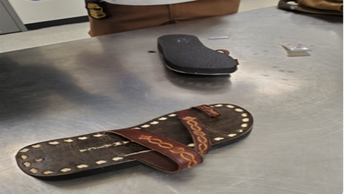 U.S. Customs and Border Protection said these sandals hid 1.3 pounds of cocaine at a baggage inspection at Miami International Airport. The traveler from Jamaica also swallowed 28 drug pellets, according to report.