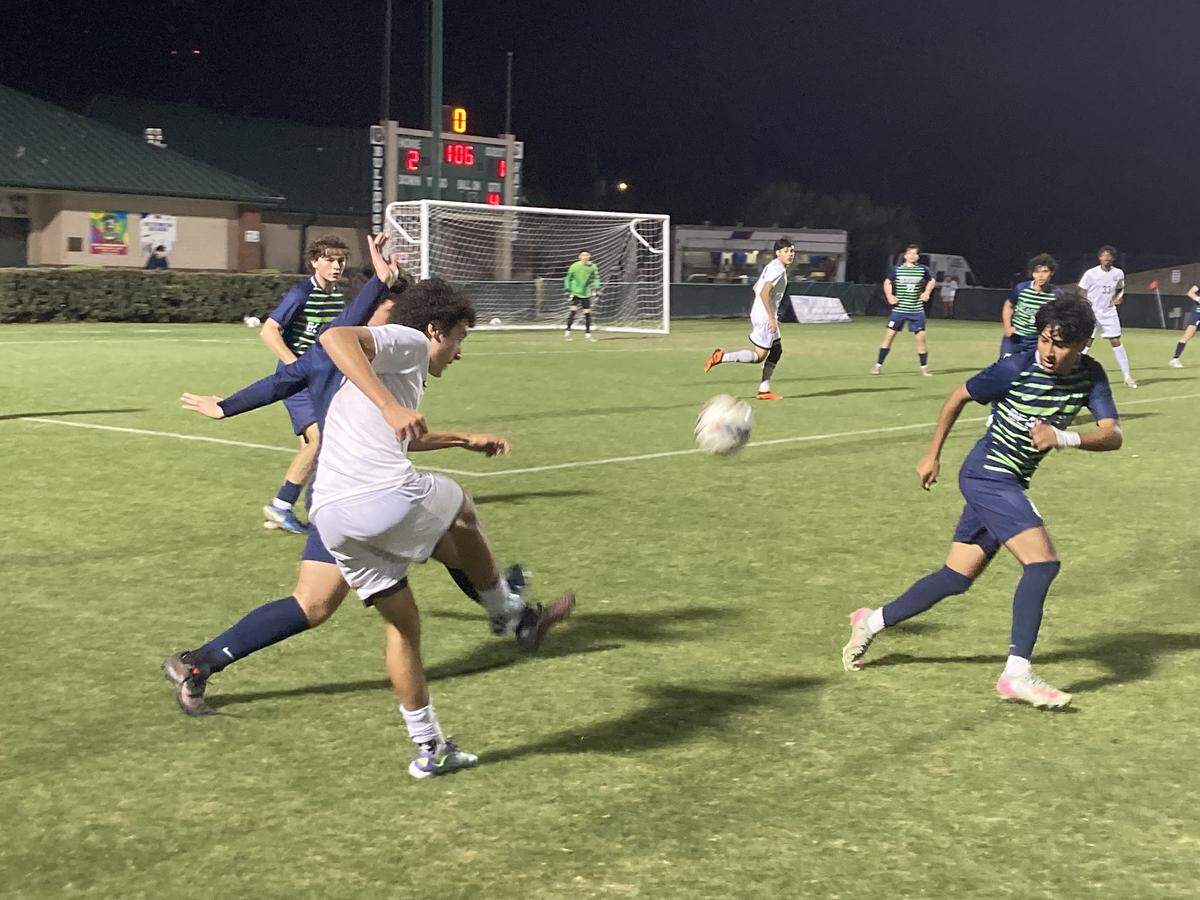 Pembroke Pines Charter’s Lucas Prandini sends a shot goalward at the Beachside net during Saturday’s Class 5A state championship game at Spec Martin Stadium in DeLand, Fla.