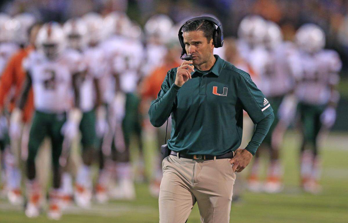Miami Hurricanes Defensive Coordinator Manny Diaz, shown here last month at Virginia, has been nominated for the prestigious Broyles Award for the third year in a row.