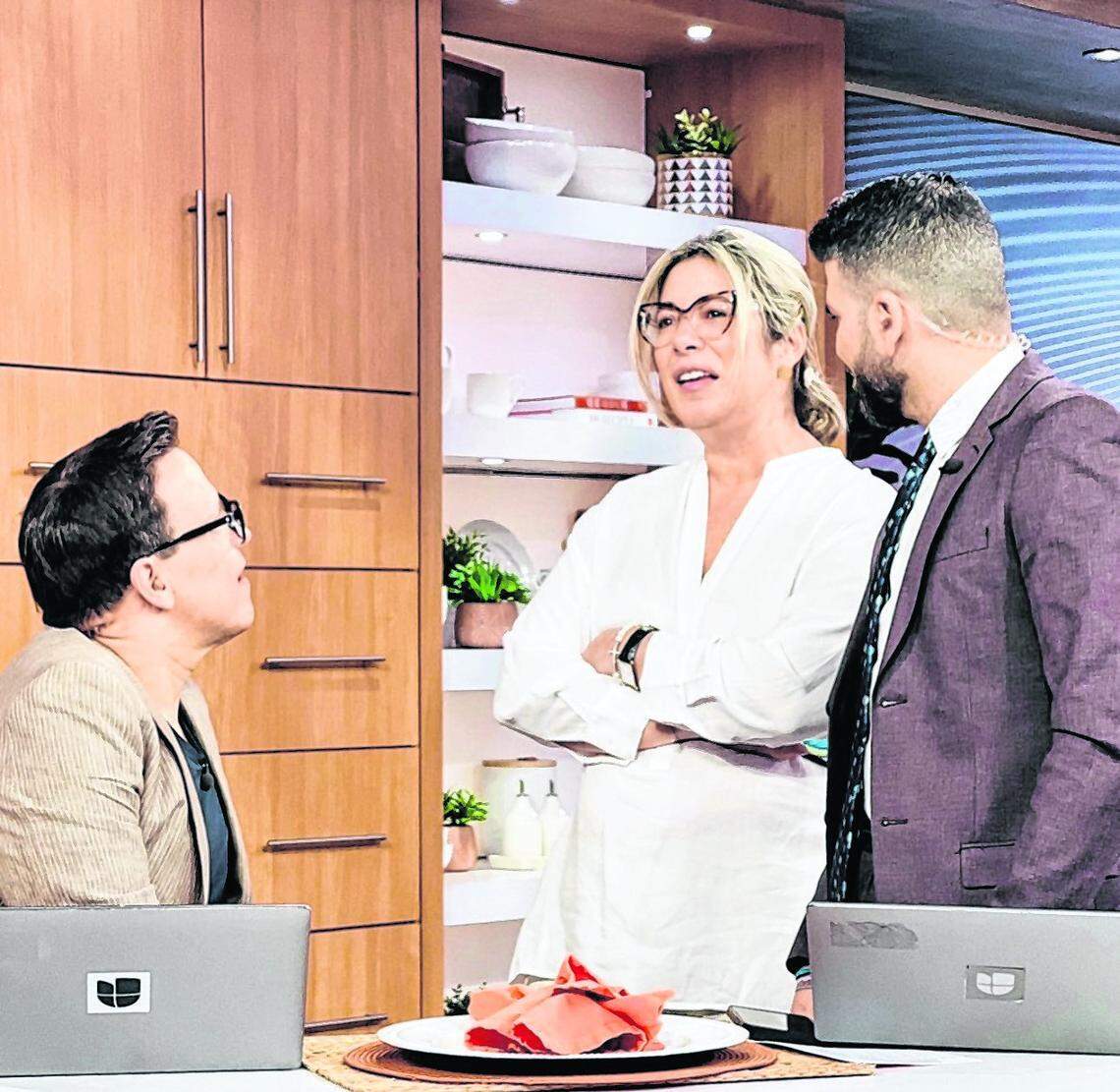 Univision producer Luz María Doria on the set of the network’s “Despierta América” with Raul González and Jomari Goysu in a file photo from May 13, 2024.