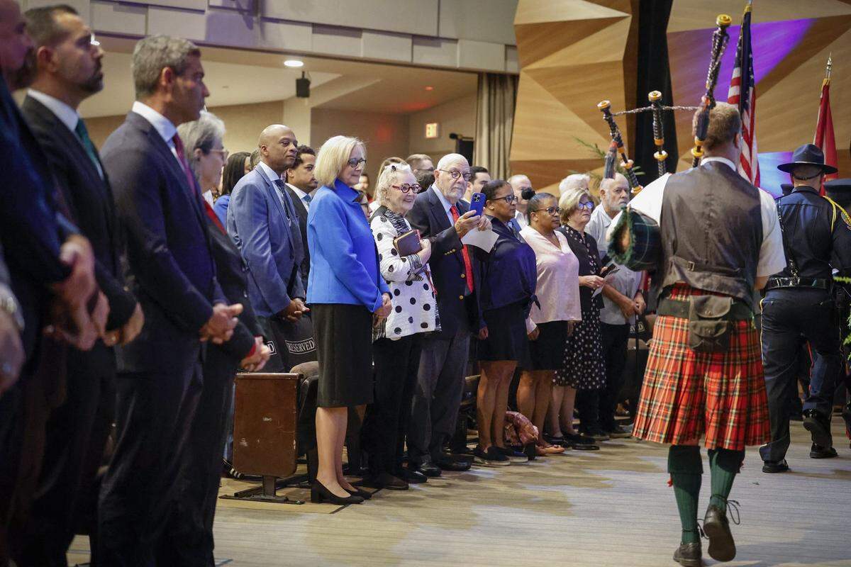 The installation ceremony for Eileen Higgins,wearing a blue top, as the Mayor of the City of Miami at the Miami-Dade College Wolfson Campus Auditorium in Miami, Florida, on Thursday, December 18, 2025. 